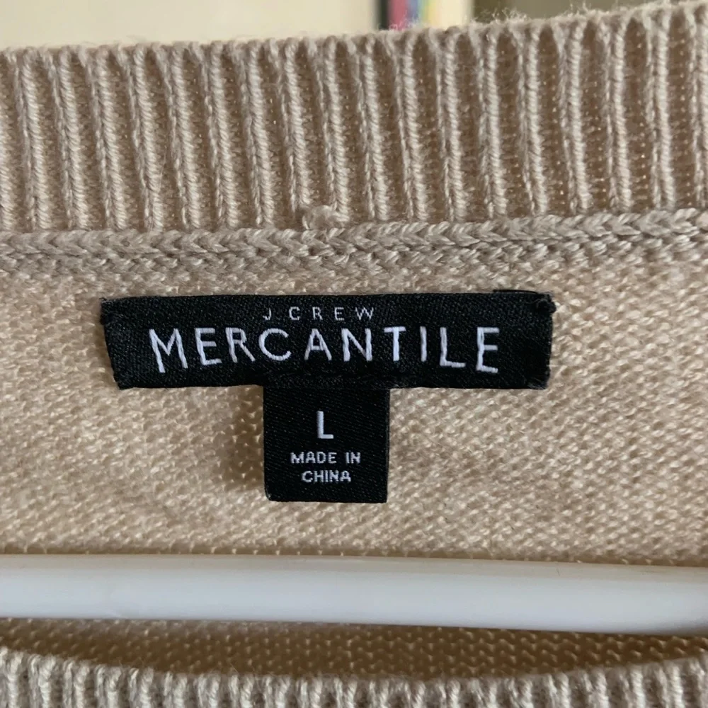 J. Crew crew neck sweater with bow tie sleeves.